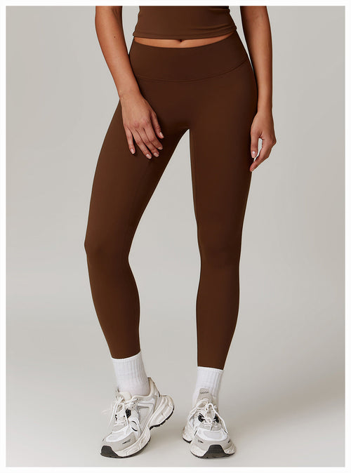 Brushed High-Waist Sculpting Yoga Leggings in Espresso — front view on model
