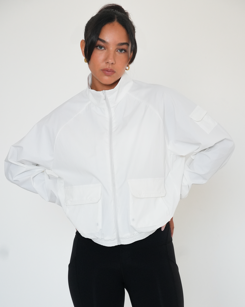 Cargo Nylon Active Windbreaker Jacket in Off White — front view